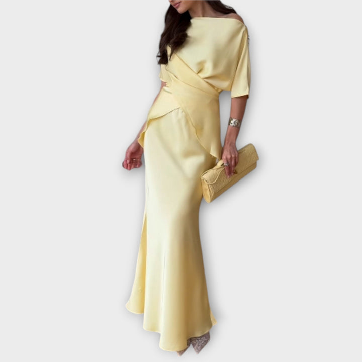 Finja - Topi ar kailām plecām un mezglu priekšā ar svārkiem