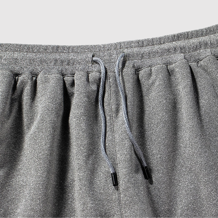 Mikkel – Sporta bikses ar sānu svītrām