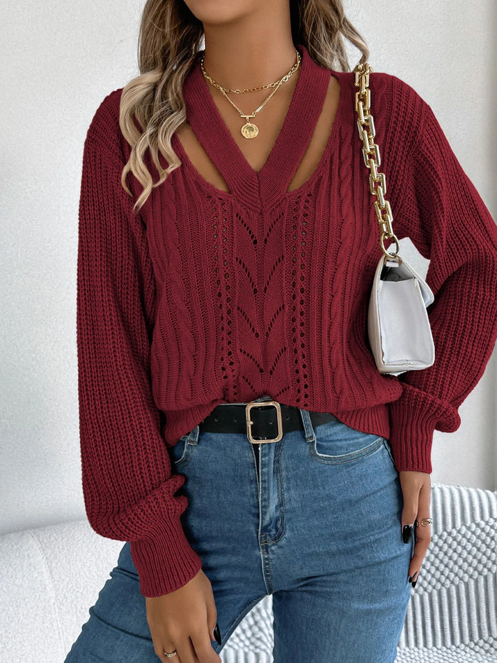 V veida izgriezuma adīta džemperis