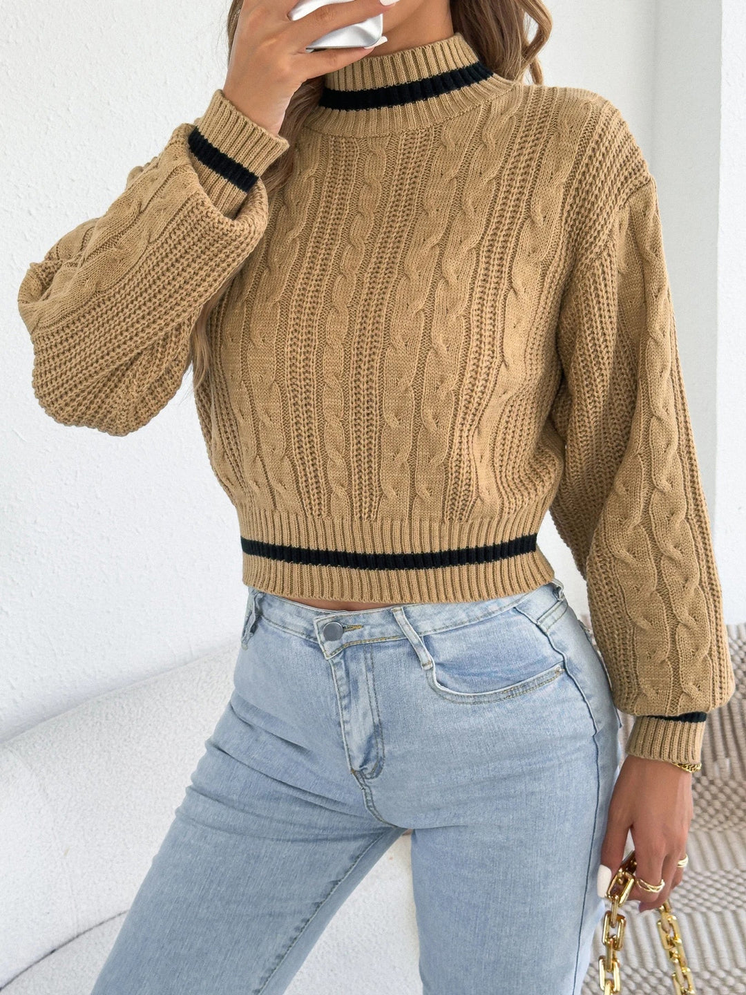 Vērptās adītas svītrainās džemperis