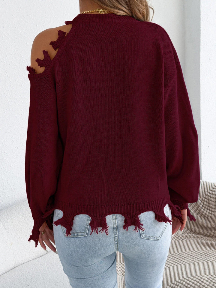 Plecu bez piedurknēm ar pušķiem džemperis