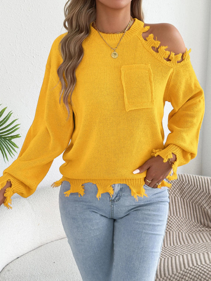 Plecu bez piedurknēm ar pušķiem džemperis