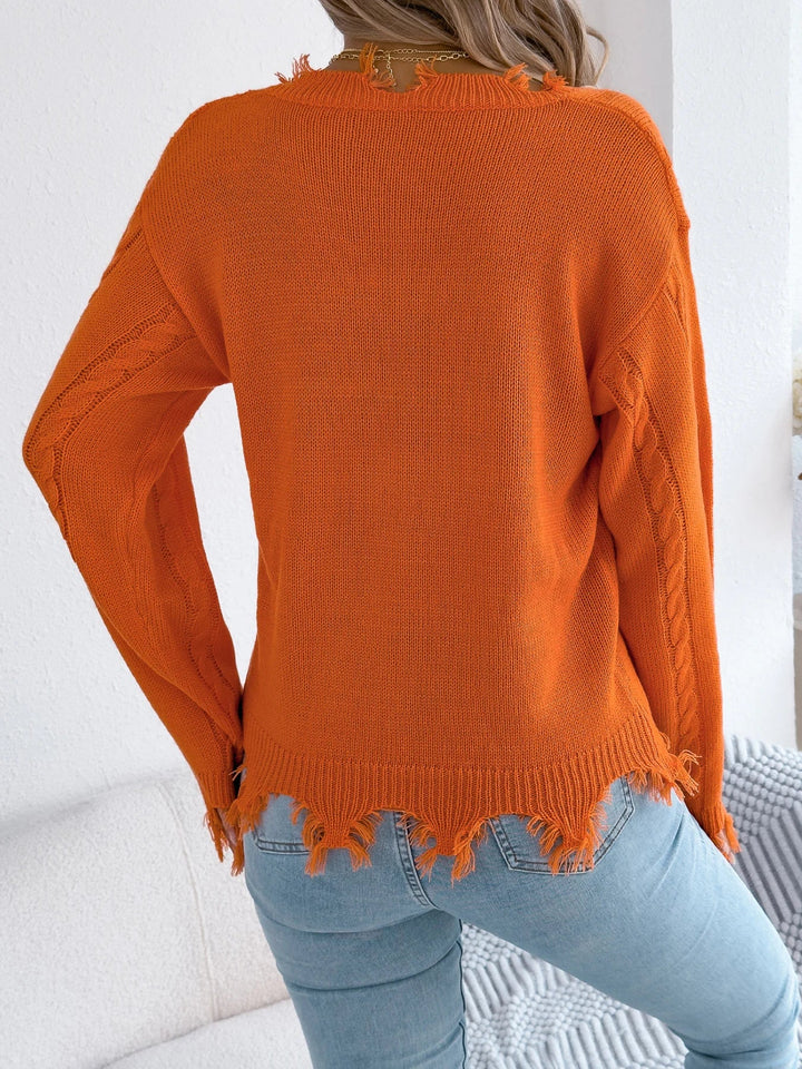 Izplēstas pušķu lanternas piedurkņu adīta džemperis