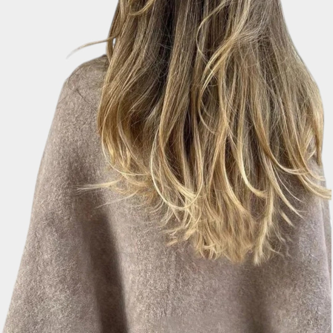 Liene – Īss vaļīgs kardigāns ar brīvām piedurknēm